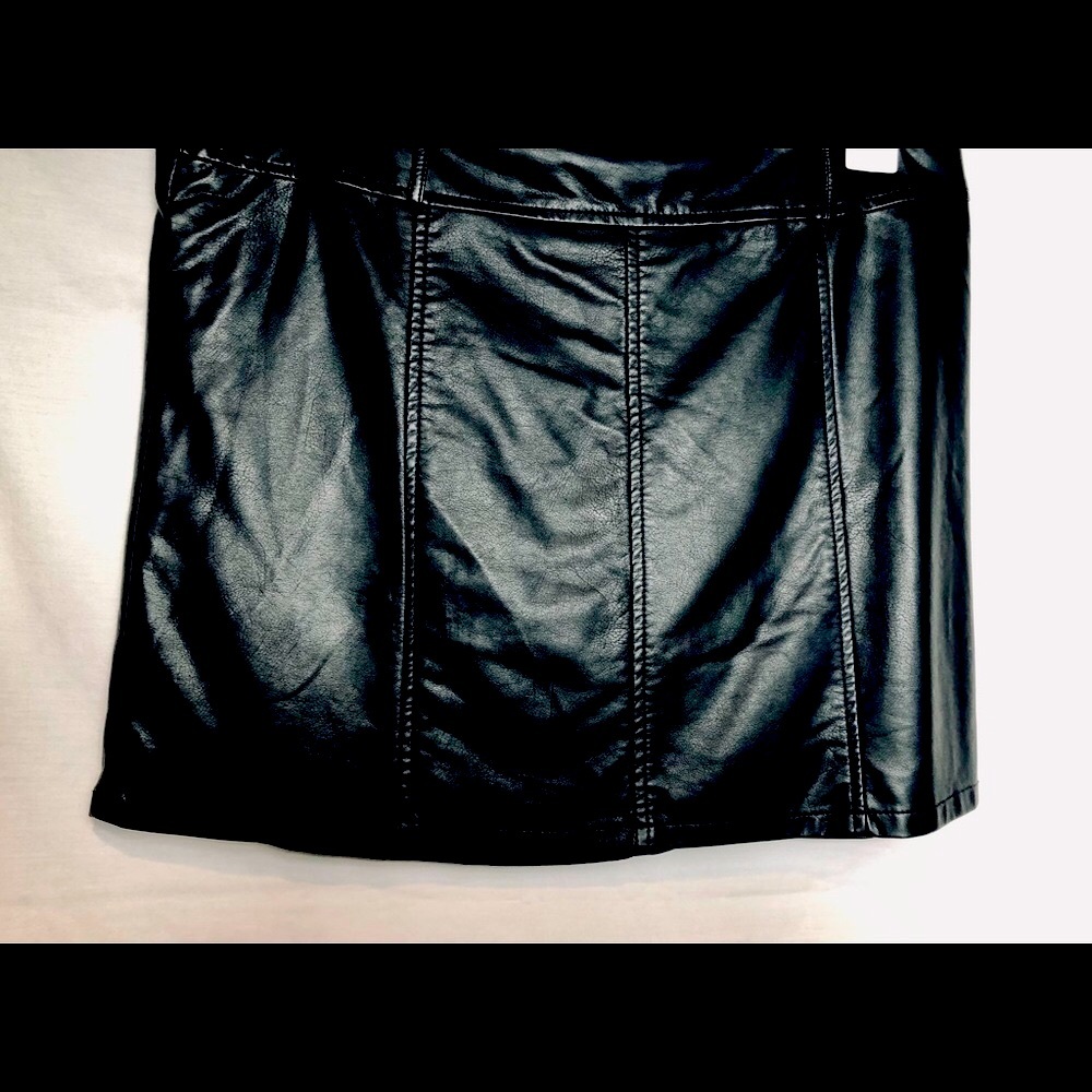 Woman’s leather mini shirt. Allen B leathers